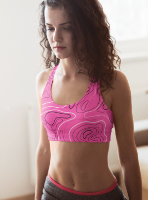 sports-bra-mockup-of-a-curly-haired-woman-exercising-at-home-m2744-r-el2